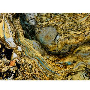 Abstract image of rocks on Whitesands beach. Yellow, Grey, Turquoise and Black